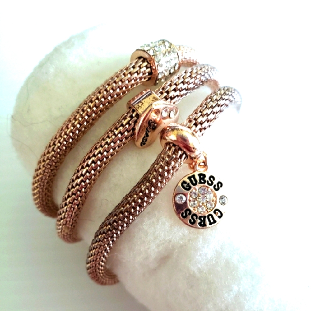 Guess Gold Coiled Bracelet with Charm